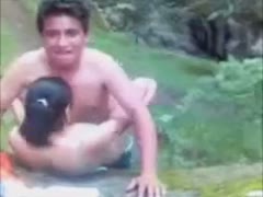 In a jungle, my Mexican girlfriend and I are having sex.